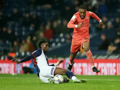 FILE PHOTO: Soccer Football - Championship - West Bromwich Albion v Swansea City - The Hawthorns, West Bromwich, Britain - February 28, 2022 West Bromwich Albion's Quevin Castro in action with Swansea City's Olivier Ntcham Action Images/Carl Recine EDITORIAL USE ONLY. No use with unauthorized audio, video, data, fixture lists, club/league logos or "live" services. Online in-match use limited to 75 images, no video emulation. No use in betting, games or single club/league/player publications. Please contact your account representative for further details./File Photo