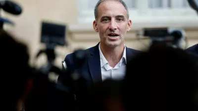 FILE PHOTO: Raphael Glucksmann, MEP and co-president of the political movement "Place Publique", talks to journalists as he leaves after a meeting with the French Prime Minister as part of a series of consultations with political parties, a week before a confidence vote he is seeking from the National Assembly on the budget issue, at the Hotel Matignon in Paris, France, September 2, 2025. REUTERS/Benoit Tessier/File Photo
