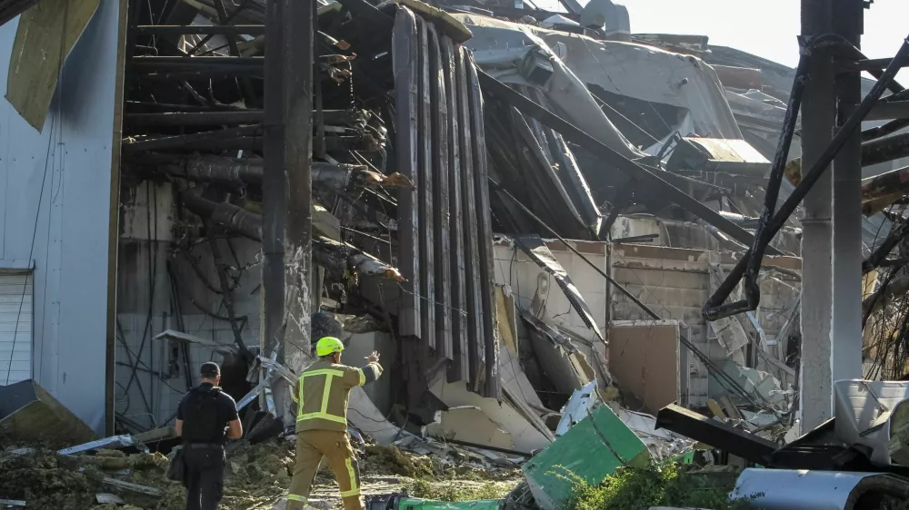 Rescuers work at the site of a shopping centre destroyed by yesterday's Russian drone attack, amid Russia's attack on Ukraine, in the city of Kryvyi Rih, Dnipropetrovsk region, Ukraine, August 22, 2026. REUTERS/Stringer