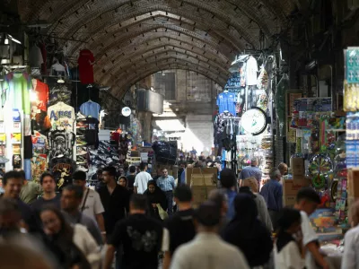 People walk in the Grand Bazaar in Tehran, Iran, August 23, 2026. Majid Asgaripour/WANA (West Asia News Agency) via REUTERS ATTENTION EDITORS - THIS PICTURE WAS PROVIDED BY A THIRD PARTY. ISRAEL OUT. NO COMMERCIAL OR EDITORIAL SALES IN ISRAEL. NO ACCESS FOR ISRAELI MEDIA. NO USE BBC PERSIAN. NO USE VOA PERSIAN. NO USE MANOTO. NO USE IRAN INTERNATIONAL. NO USE RADIO FARDA. DIGITAL: NO USE BBC PERSIAN. NO USE VOA PERSIAN. NO USE MANOTO. NO USE IRAN INTERNATIONAL. NO USE RADIO FARDA.