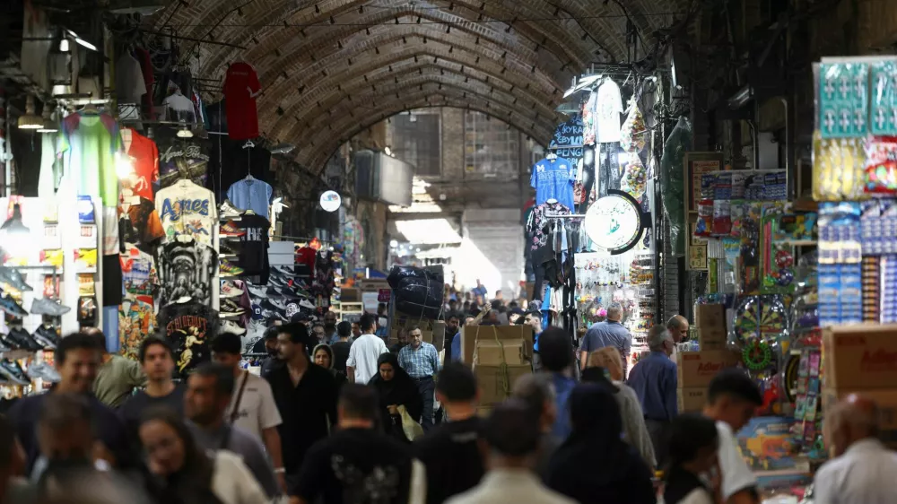 People walk in the Grand Bazaar in Tehran, Iran, August 23, 2026. Majid Asgaripour/WANA (West Asia News Agency) via REUTERS ATTENTION EDITORS - THIS PICTURE WAS PROVIDED BY A THIRD PARTY. ISRAEL OUT. NO COMMERCIAL OR EDITORIAL SALES IN ISRAEL. NO ACCESS FOR ISRAELI MEDIA. NO USE BBC PERSIAN. NO USE VOA PERSIAN. NO USE MANOTO. NO USE IRAN INTERNATIONAL. NO USE RADIO FARDA. DIGITAL: NO USE BBC PERSIAN. NO USE VOA PERSIAN. NO USE MANOTO. NO USE IRAN INTERNATIONAL. NO USE RADIO FARDA.