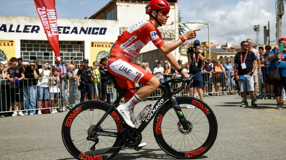 11 Tadej Pogacar of UAE Team Emirates - XRG weating the leader red jersey during the La Vuelta Espana 2026 from Monaco to Granada, Stage 5 from Falset to Roquetes of 173km in Catalonia, on 26th of August, 2026 in Spain.,Image: 1128667491, License: Rights-managed, Restrictions: RESTRICTED TO EDITORIAL USE, Model Release: no 