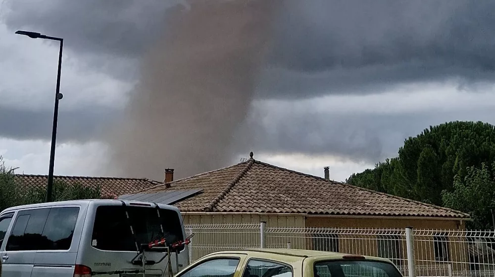 A large tornado moves through Verzeille, France, August 24, 2026, in this screen grab obtained from a social media video. DENIS MARECHAL/via REUTERS THIS IMAGE HAS BEEN SUPPLIED BY A THIRD PARTY. MANDATORY CREDIT. NO RESALES. NO ARCHIVES. Verification: -Location verified by houses, road layout, utility poles and trees that matched archive and satellite imagery -Coordinates: 43.12398050745493, 2.325234124258081 -French meteorological administration issued an alert for thunderstorms in Aude department -Date verified by original file metadata