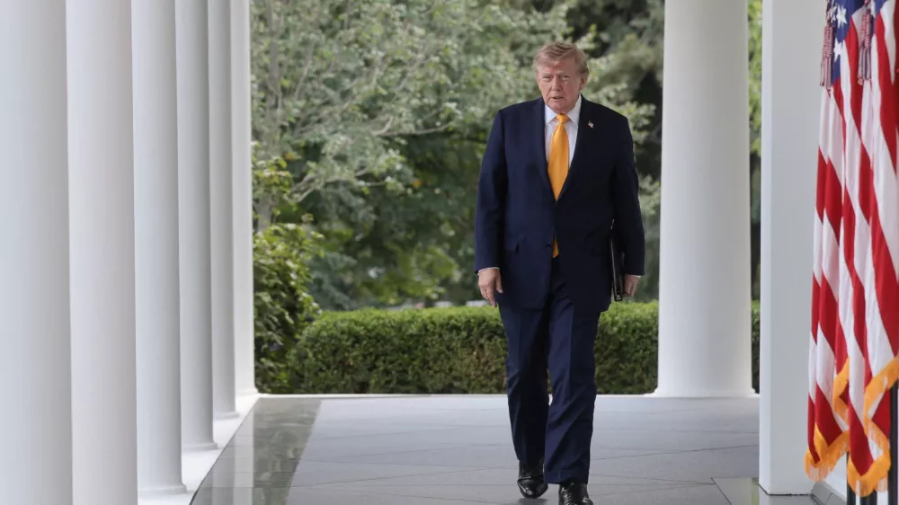U.S. President Donald Trump walks as he attends to host a back-to-school-themed event to highlight his administration's education policies, in the Rose Garden at the White House in Washington, D.C., U.S., August 24, 2026. REUTERS/Jonathan Ernst