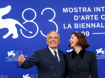 Alberto Barbera and Venezia 83 Competition Jury president Maggie Gyllenhaal pose at the 83rd Venice International Film Festival, in Venice, Italy, September 2, 2026. REUTERS/Yves Herman