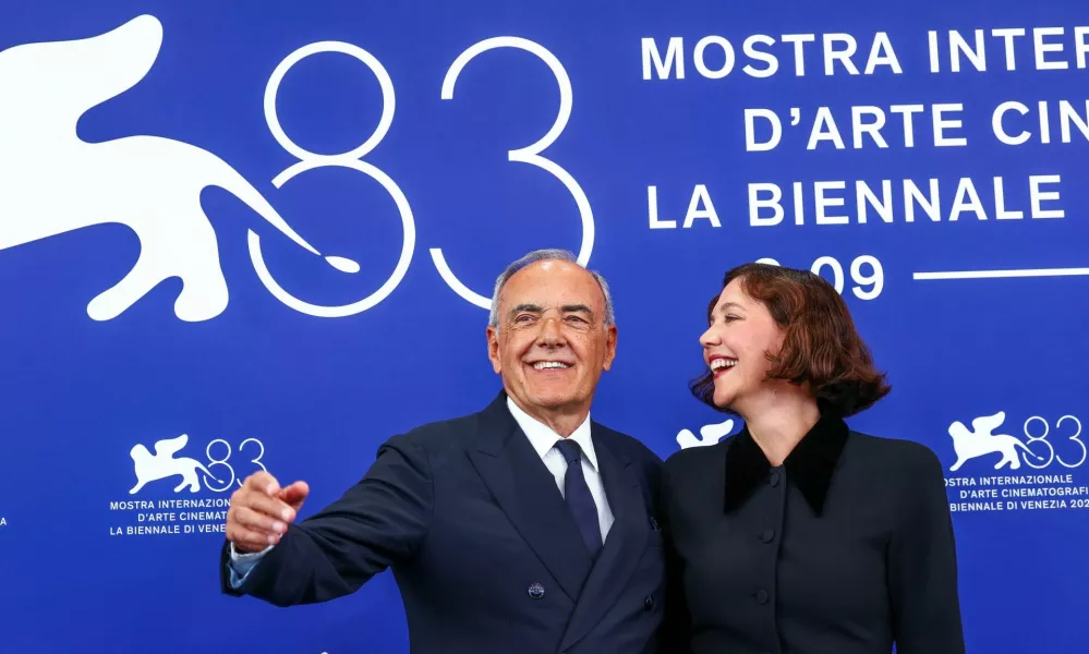 Alberto Barbera and Venezia 83 Competition Jury president Maggie Gyllenhaal pose at the 83rd Venice International Film Festival, in Venice, Italy, September 2, 2026. REUTERS/Yves Herman