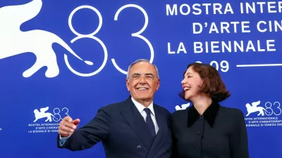 Alberto Barbera and Venezia 83 Competition Jury president Maggie Gyllenhaal pose at the 83rd Venice International Film Festival, in Venice, Italy, September 2, 2026. REUTERS/Yves Herman