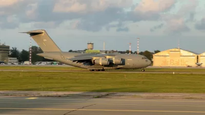 A C-17 Globemaster, believed to be carrying U.S. CIA Director John Ratcliffe, lands near Riga, Latvia, August 25, 2026, in this frame obtained from a social media video. @ALFREDSPODINS VIA X/via REUTERS THIS IMAGE HAS BEEN SUPPLIED BY A THIRD PARTY. MANDATORY CREDIT.
