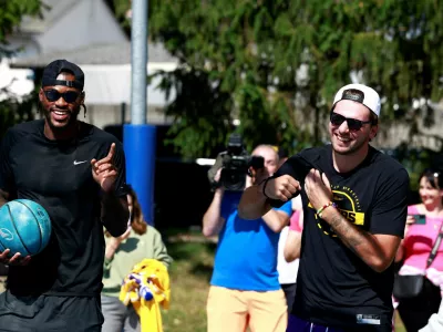 Basketball - NBA - Los Angeles Lakers visit to Ljubljana - Ljubljana, Slovenia - August 23, 2026 Los Angeles Lakers' Luka Doncic with Jarred Vanderbilt on the court where he played growing up in Ljubljana REUTERS/Borut Zivulovic