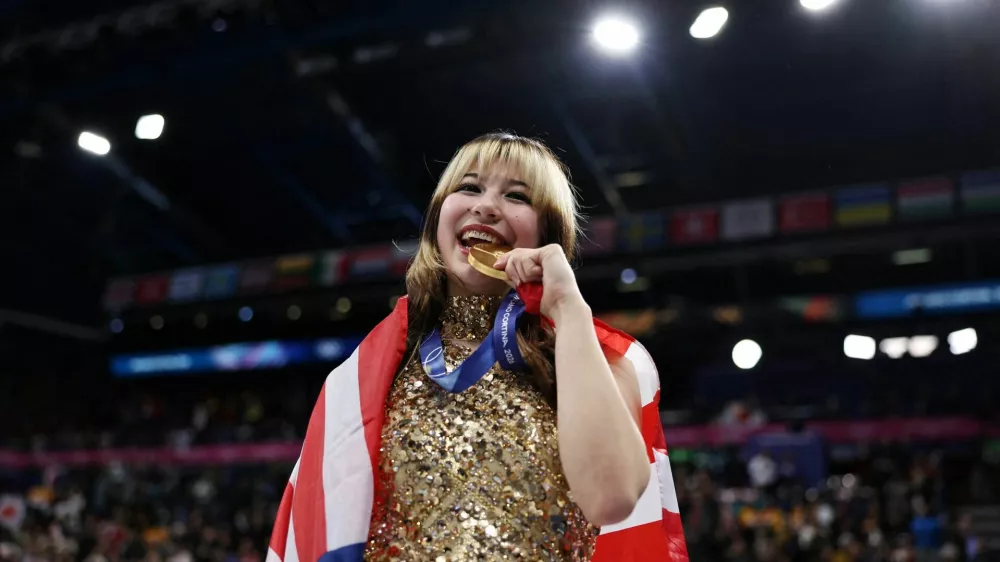 FILE PHOTO: Milano Cortina 2026 Olympics - Figure Skating - Women Single Skating - Victory Ceremony - Milano Ice Skating Arena, Milan, Italy - February 19, 2026. Gold medallist Alysa Liu of United States celebrates after winning the Women Single Skating REUTERS/Amanda Perobelli/File Photo