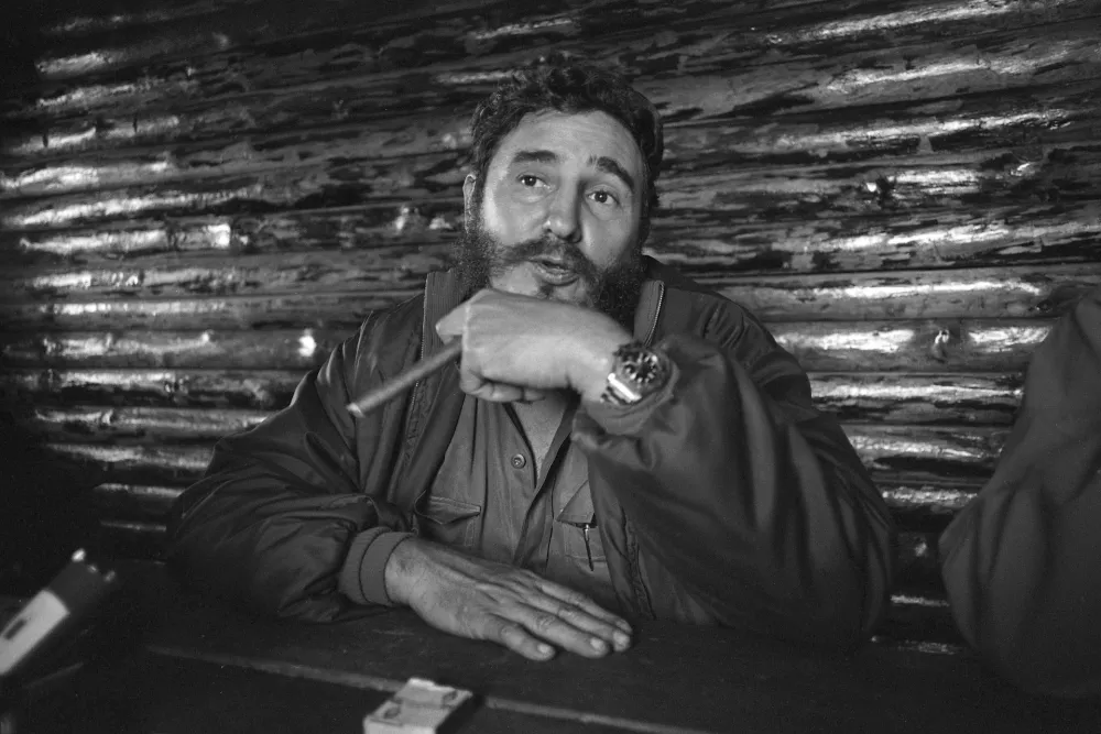 Fidel Castro, friendly portrait, portrait, portrait, cropped single image, single image, half-length portrait, with a cigar, smoking, smoking, in 1967 in Cuba; Fidel CASTRO (actually: Fidel Alejandro Castro Ruz), Cuba, politics, head of government of Cuba; SW recording, ' | usage worldwide Photo by: Sven Simon/picture-alliance/dpa/AP Images