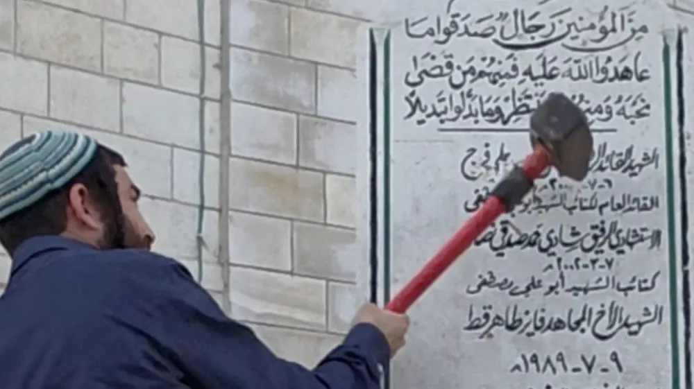 Tzvi Sukkot, a member of the Israeli Knesset, smashes a monument in Madama in the Israeli-occupied West Bank August 25, 2026, in this screen grab obtained from a handout video. Yosi Reiner, Tzvi Sukkot's office handout/Handout via REUTERS  THIS IMAGE HAS BEEN SUPPLIED BY A THIRD PARTY. VERIFICATION: -Monument, buildings, and road layout matched archive and satellite imagery -Date verified by statement from Tzvi Sukkot's office and Israeli military saying incident happened on Tuesday (August 25) -Israeli Military said soldiers were present during the incident as security for the member of Knesset who requested it earlier in the month for the tour of several areas -However, Israeli Military said the participants of the tour acted deceptively and began demolishing one of the monuments in Madama without authorization