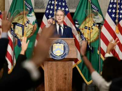 FILE PHOTO: U.S. Treasury Secretary Scott Bessent points as reporters raise their hands during a press conference to outline further sanctions against Iran, at the Treasury Department in Washington, D.C., U.S., August 24, 2026. REUTERS/Evelyn Hockstein/File Photo