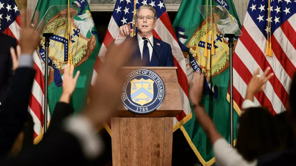 FILE PHOTO: U.S. Treasury Secretary Scott Bessent points as reporters raise their hands during a press conference to outline further sanctions against Iran, at the Treasury Department in Washington, D.C., U.S., August 24, 2026. REUTERS/Evelyn Hockstein/File Photo