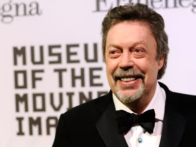 FILE - Tim Curry attends the Museum of the Moving Image salute to Alec Baldwin in New York on Feb. 28, 2011. (AP Photo/Peter Kramer, File)