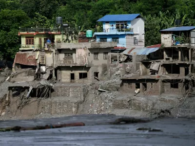 Damaged houses following devastating floods, in Trishuli in Nuwakot district, Nepal, August 27, 2026. REUTERS/Navesh Chitrakar