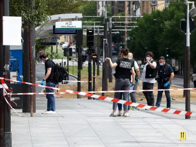 Police officers work at the site of a knife attack near the Porte de Clichy in Paris, France July 27, 2026. REUTERS/Abdul Saboor