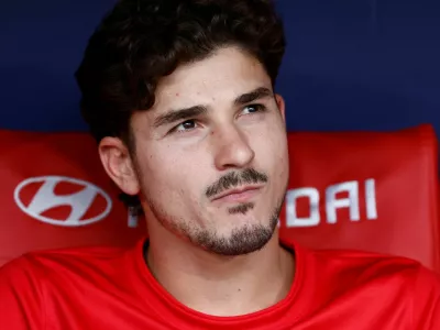 FILE PHOTO: Soccer Football - LaLiga - Atletico Madrid v Villarreal - Riyadh Air Metropolitano, Madrid, Spain - August 23, 2026 Atletico Madrid's Julian Alvarez on the bench before the match REUTERS/Thomas Peter/File Photo