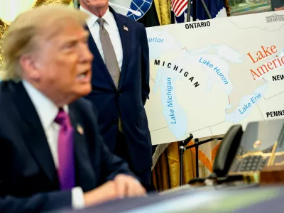 U.S. President Donald Trump speaks next to a map with "Lake America" written on it as he attends an event to sign an executive order renaming Lake Ontario as Lake America at the Oval Office of the White House in Washington, D.C., U.S., August 27, 2026. REUTERS/Evan Vucci