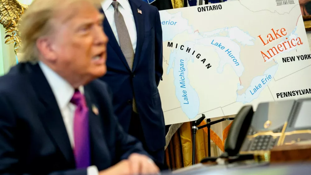 U.S. President Donald Trump speaks next to a map with "Lake America" written on it as he attends an event to sign an executive order renaming Lake Ontario as Lake America at the Oval Office of the White House in Washington, D.C., U.S., August 27, 2026. REUTERS/Evan Vucci