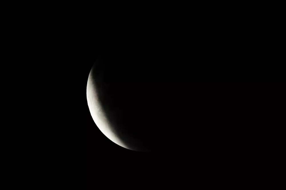 The moon during a partial lunar eclipse in the sky over Brasilia, Brazil, August 28, 2026. REUTERS/Adriano Machado