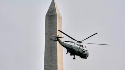 Marine One with President Donald Trump on board lifts off from the Ellipse near the White House and past the Washington Monument, Thursday, Aug. 27, 2026, in Washington, en route to Houston. (AP Photo/Jacquelyn Martin)