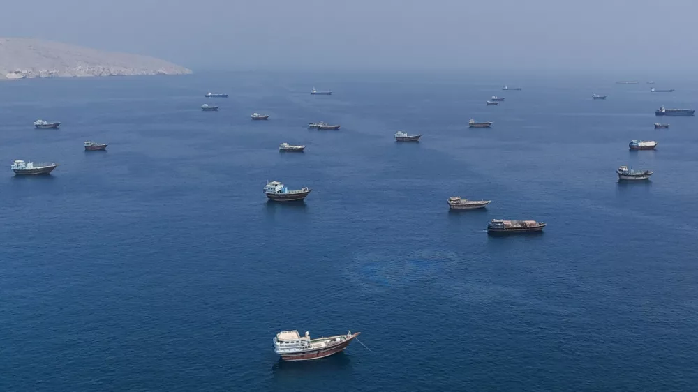 A drone view shows vessels near the Strait of Hormuz, as seen from Musandam, Oman, August 28, 2026. REUTERS/Stringer