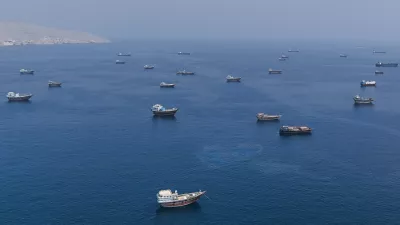 A drone view shows vessels near the Strait of Hormuz, as seen from Musandam, Oman, August 28, 2026. REUTERS/Stringer