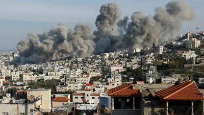 Smoke rises during an Israeli army operation in Jenin, in the Israeli-occupied West Bank, February 2, 2025. REUTERS/Mohammed Torokman