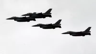 ** FILE ** Greek F-16 fighter jets participate in Independence Day celebrations in Athens on Saturday, March 25, 2006. A Greek F-16 fighter jet and a Turkish warplane collided as they shadowed each other Tuesday, and crashed near the Greek island of Karpathos in the Aegean Sea on Tuesday, May 23, 2006. (AP Photo/Thanassis Stavrakis, File)