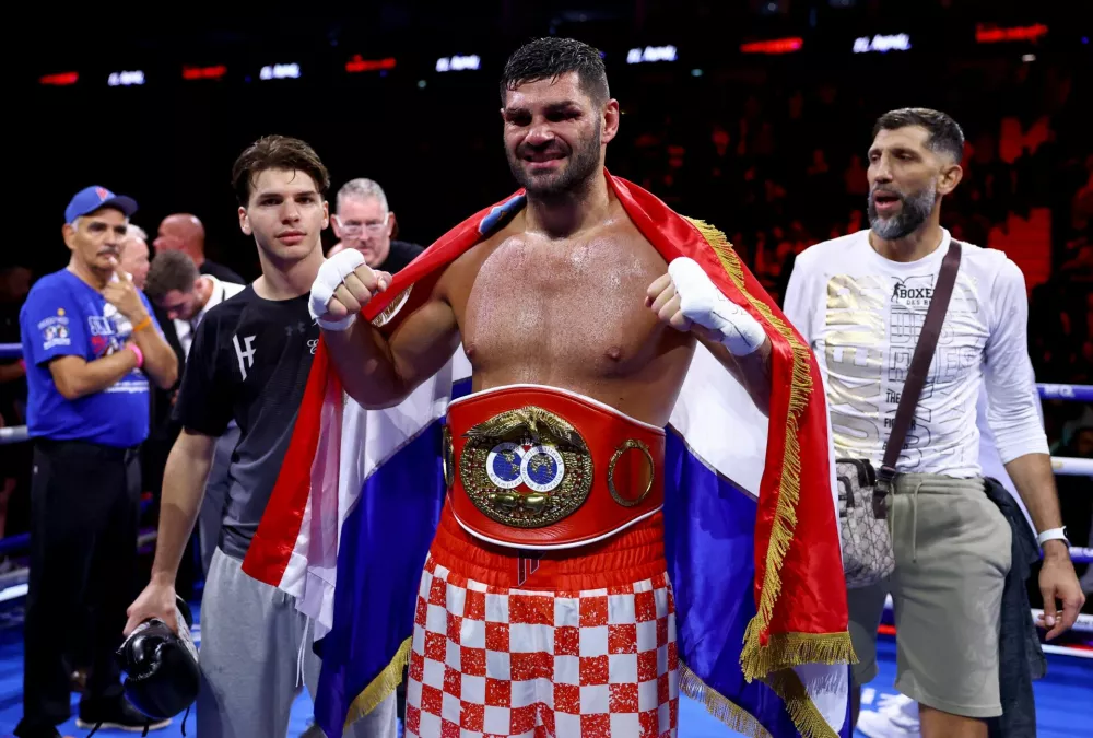 Boxing - Moses Itauma v Filip Hrgovic - IBF World Heavyweight Title - O2 Arena, London, Britain - August 29, 2026 Filip Hrgovic poses for a photo with the title belt after winning the IBF World Heavyweight bout against Moses Itauma Action Images via Reuters/Peter Cziborra
