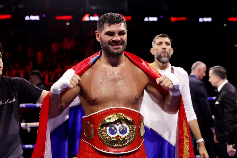 Boxer Filip Hrgovic celebrates defeating Moses Itauma for the vacant IBF world heavyweight title, Saturday, Aug. 29, 2026, in London. (Steven Paston/PA via AP)