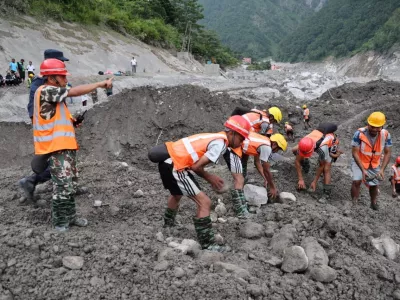 An undated handout photo of rescue workers taking part in a rescue operation near the tunnel of the Trishuli 3A Hydropower Project, following deadly flash floods and mudslides, in Rasuwa, Nepal. Nepal Army/Handout via REUTERS THIS IMAGE HAS BEEN SUPPLIED BY A THIRD PARTY. MANDATORY CREDIT. NO RESALES. NO ARCHIVES. BEST QUALITY AVAILABLE.