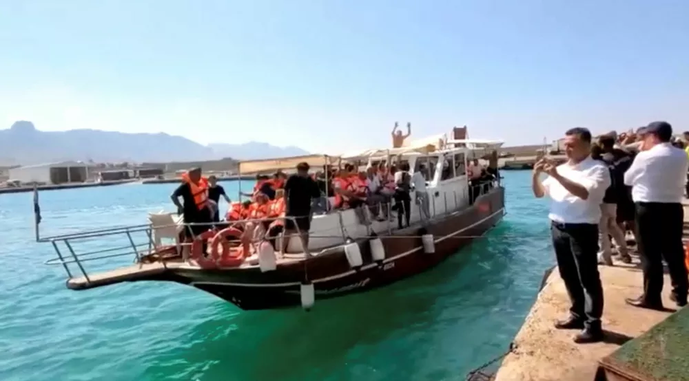 Survivors are taken to shore after boat capsizes, in Kyrenia, northern Cyprus, August 30, 2026 in this screengrab taken from a video. REUTERS/Reuters TV