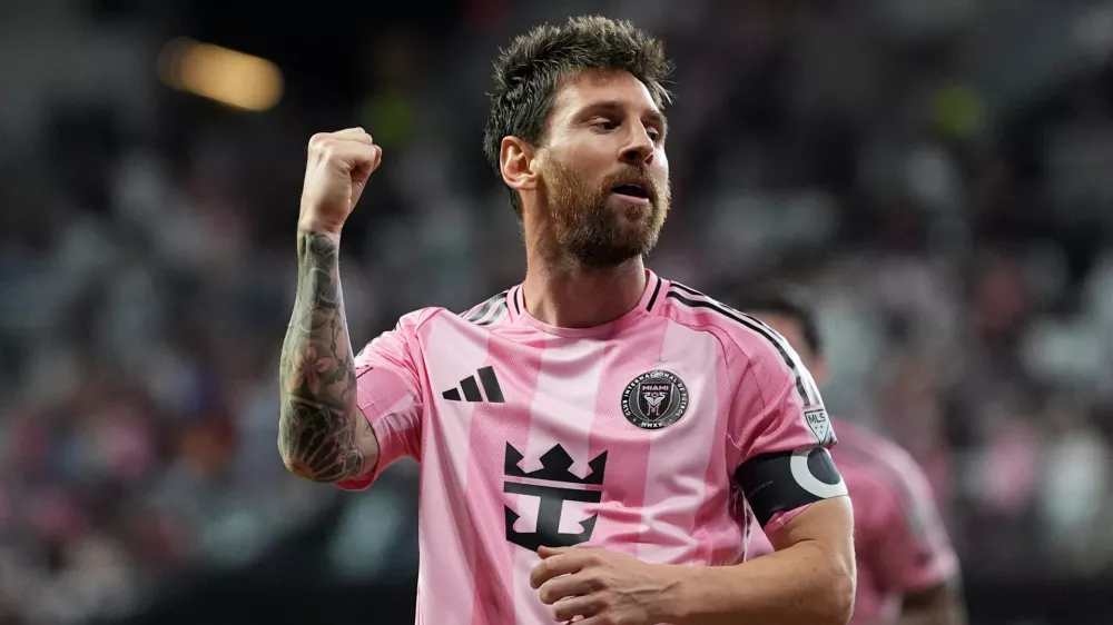 Inter Miami forward Lionel Messi celebrates after scoring his side's third goal during the second half of an MLS soccer match against CF Montreal, Saturday, Aug. 29, 2026, in Miami. (AP Photo/Rebecca Blackwell)