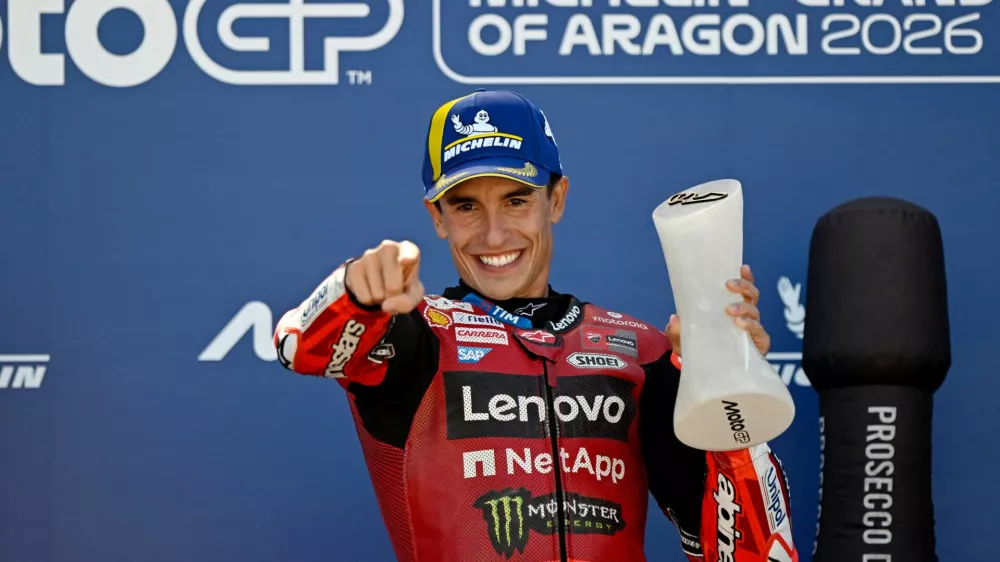 MotoGP - Aragon Grand Prix - Ciudad del Motor de Aragon, Aragon, Spain - August 30, 2026 Ducati Lenovo Team's Marc Marquez celebrates on the podium after winning the MotoGP REUTERS/Pablo Morano
