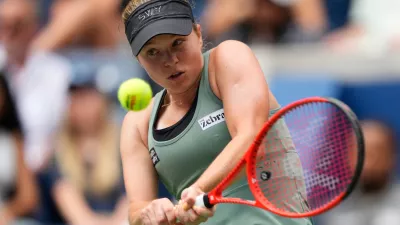 Veronika Erjavec, of Slovenia, returns the ball to Jasmine Paolini, of Italy, during the first round of the U.S. Open tennis championships Sunday, Aug. 30, 2026, in New York. (AP Photo/Yuki Iwamura)