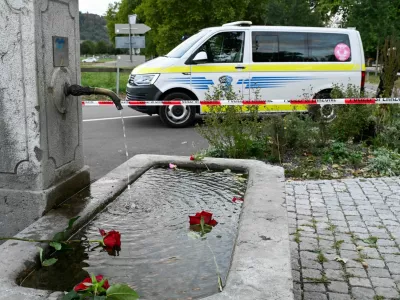 Flowers are left in tribute to victims, following a deadly shooting at a rave party, according to the police, in Aarau, Switzerland, August 30, 2026. REUTERS/Romina Amato