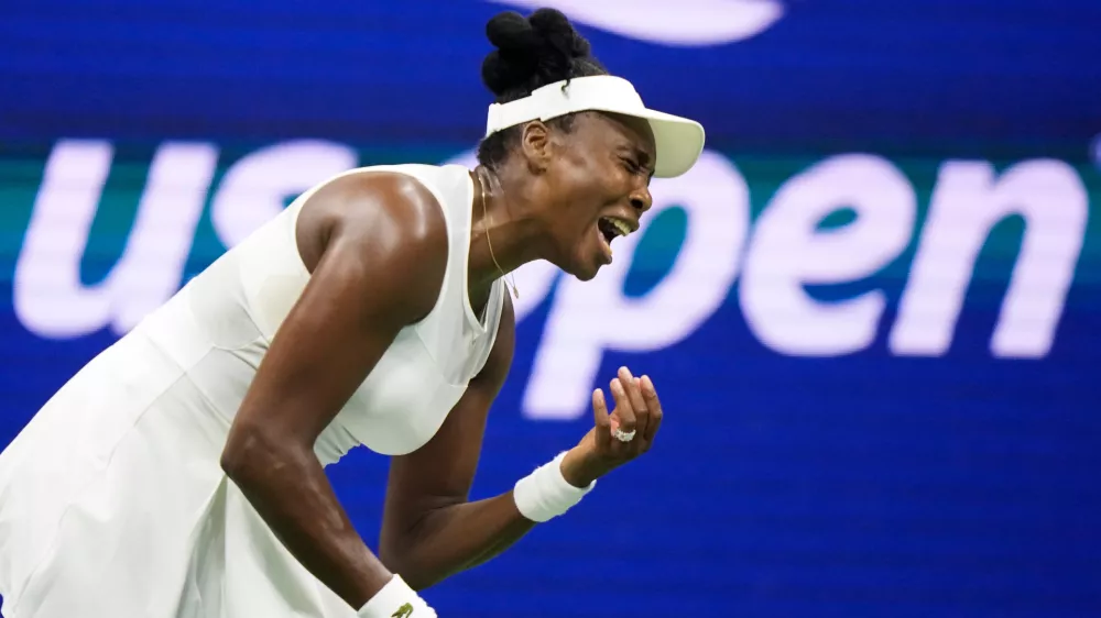 Venus Williams, of the United States, reacts during her first round match against compatriot Sofia Kenin at the U.S. Open tennis championships, Monday, Aug. 31, 2026, in New York. (AP Photo/Frank Franklin II)