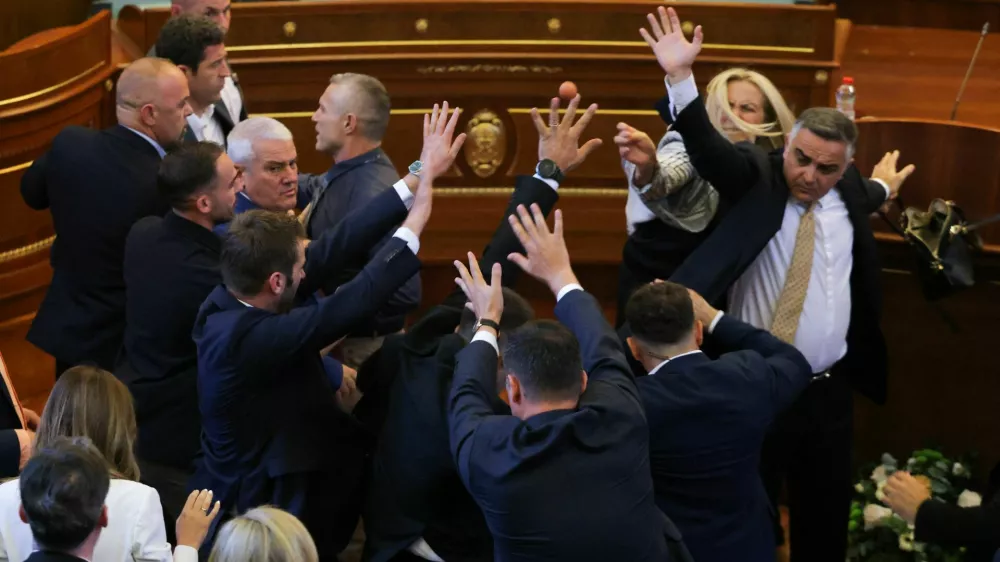 Kosovo lawmaker Time Kadriaj throws an egg at Prime Minister Albin Kurti (not pictured) during the plenary session to elect the new speaker of the parliament in Pristina, Kosovo, August 8, 2026. Kosovo parliament remains unconstituted. REUTERS/Valdrin Xhemaj