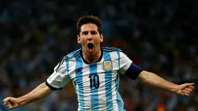 FILE PHOTO: Argentina's Lionel Messi celebrates scoring a goal during the 2014 World Cup Group F soccer match against Bosnia and Herzegovina at the Maracana stadium in Rio de Janeiro June 15, 2014. REUTERS/Michael Dalder/File Photo