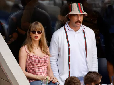 FILE PHOTO: Tennis - U.S. Open - Flushing Meadows, New York, United States - September 8, 2024 Singer Taylor Swift and Kansas City Chiefs' Travis Kelce are seen during the final match between Italy's Jannik Sinner and Taylor Fritz of the U.S. REUTERS/Eduardo Munoz/File Photo