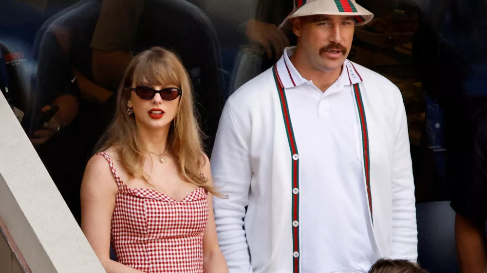 FILE PHOTO: Tennis - U.S. Open - Flushing Meadows, New York, United States - September 8, 2024 Singer Taylor Swift and Kansas City Chiefs' Travis Kelce are seen during the final match between Italy's Jannik Sinner and Taylor Fritz of the U.S. REUTERS/Eduardo Munoz/File Photo