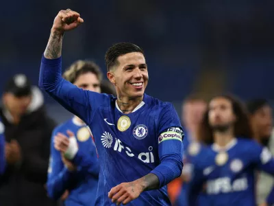 FILE PHOTO: Soccer Football - Premier League - Chelsea v Tottenham Hotspur - Stamford Bridge, London, Britain - May 19, 2026 Chelsea's Enzo Fernandez celebrates after the match REUTERS/David Klein EDITORIAL USE ONLY. NO USE WITH UNAUTHORIZED AUDIO, VIDEO, DATA, FIXTURE LISTS, CLUB/LEAGUE LOGOS OR 'LIVE' SERVICES. ONLINE IN-MATCH USE LIMITED TO 120 IMAGES, NO VIDEO EMULATION. NO USE IN BETTING, GAMES OR SINGLE CLUB/LEAGUE/PLAYER PUBLICATIONS. PLEASE CONTACT YOUR ACCOUNT REPRESENTATIVE FOR FURTHER DETAILS../File Photo