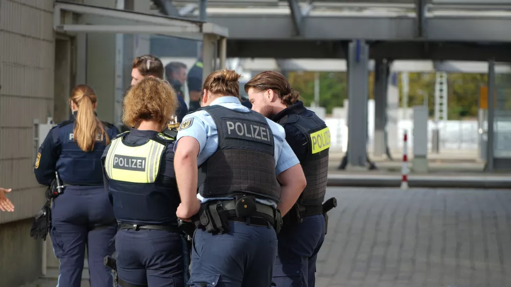 Police officers are stationed near Augsburg's main train station in Augsburg, Germany, Wednesday, Sept. 2, 2026. (Felix Kirberg/dpa via AP)