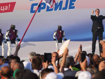 Serbian President Aleksandar Vucic addresses a rally of the ruling Serbian Progressive Party (SNS) in Belgrade, Serbia, Saturday, June 27, 2026, where he announced that he will resign in the coming weeks. (AP Photo/Darko Vojinovic)