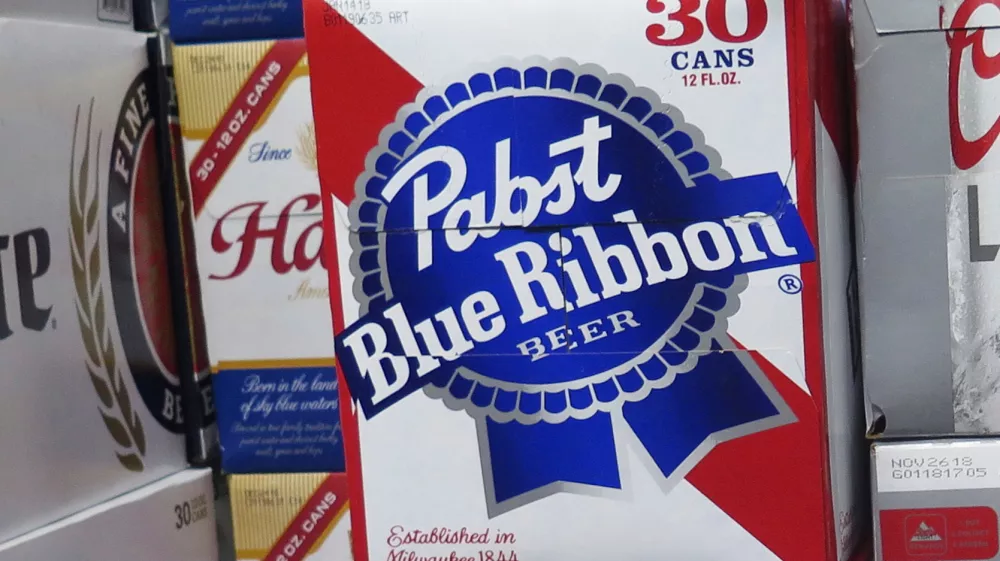 FILE - Cases of Pabst Blue Ribbon beer are stacked in a liquor store, Nov. 8, 2018, in Milwaukee. (AP Photo/Ivan Moreno, File)