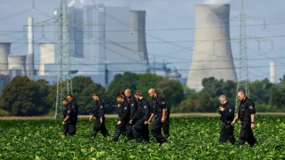 German police officers search a field near a power plant after a second sabotage attempt on Germany's electricity grid, with local police saying they are investigating an attack on a substation in Bergheim, Germany, September 2, 2026. REUTERS/Thilo Schmuelgen