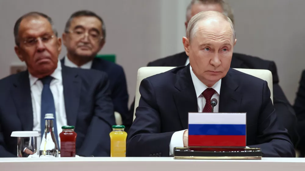 Russian President Vladimir Putin, right, and Russian Foreign Minister Sergey Lavrov, left, attend the Shanghai Cooperation Organization (SCO) summit, in Bishkek, Kyrgyzstan, on Tuesday, Sept. 1, 2026. (Vyacheslav Prokofyev, Sputnik, Kremlin Pool Photo via AP)