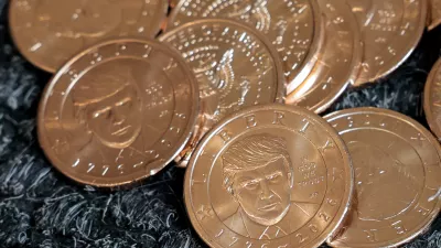 U.S. President Donald Trump's portrait on  coins, in honor of the nation's 250th anniversary of independence, on the day the coin is released for sale, is seen in this illustration taken, September 2, 2026. REUTERS/Kylie Cooper/Illustration